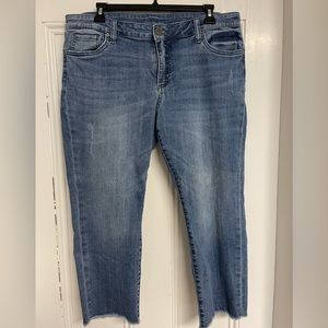 Kut from the Kloth brand crop jeans. Cut/fringe edge on the bottoms.